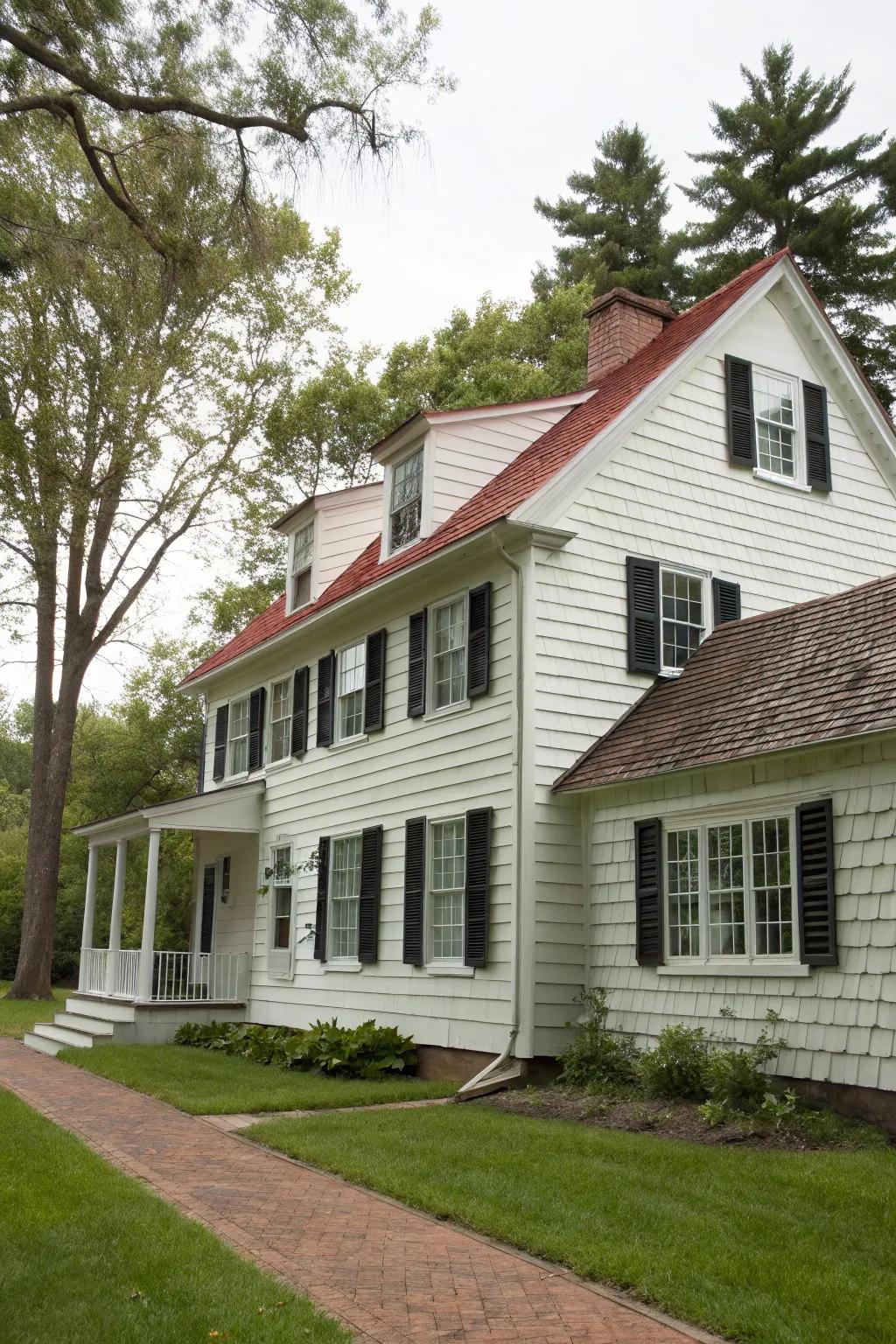 Colonial-style home with textured shake siding.