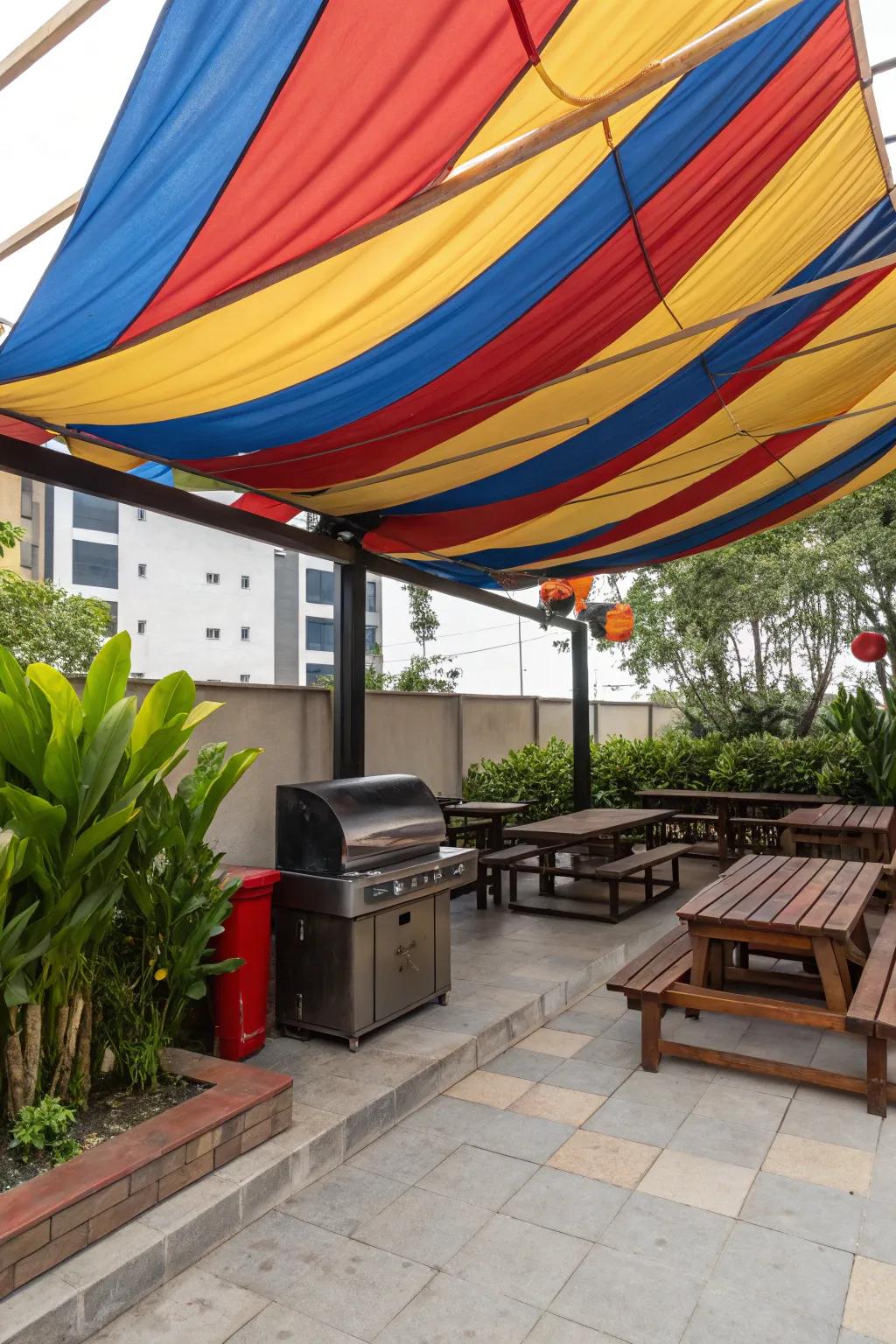 A vibrant fabric canopy adding playful charm to a grill area.
