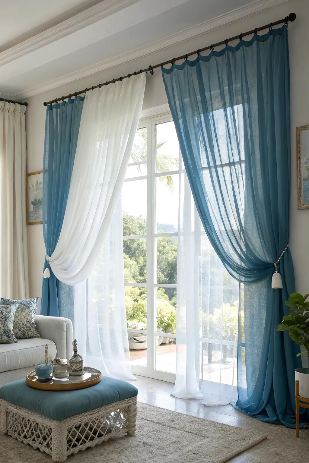 Layering sky-tinted drapes with ivory see-throughs fashions a light and airy ambiance, offering versatile light control.