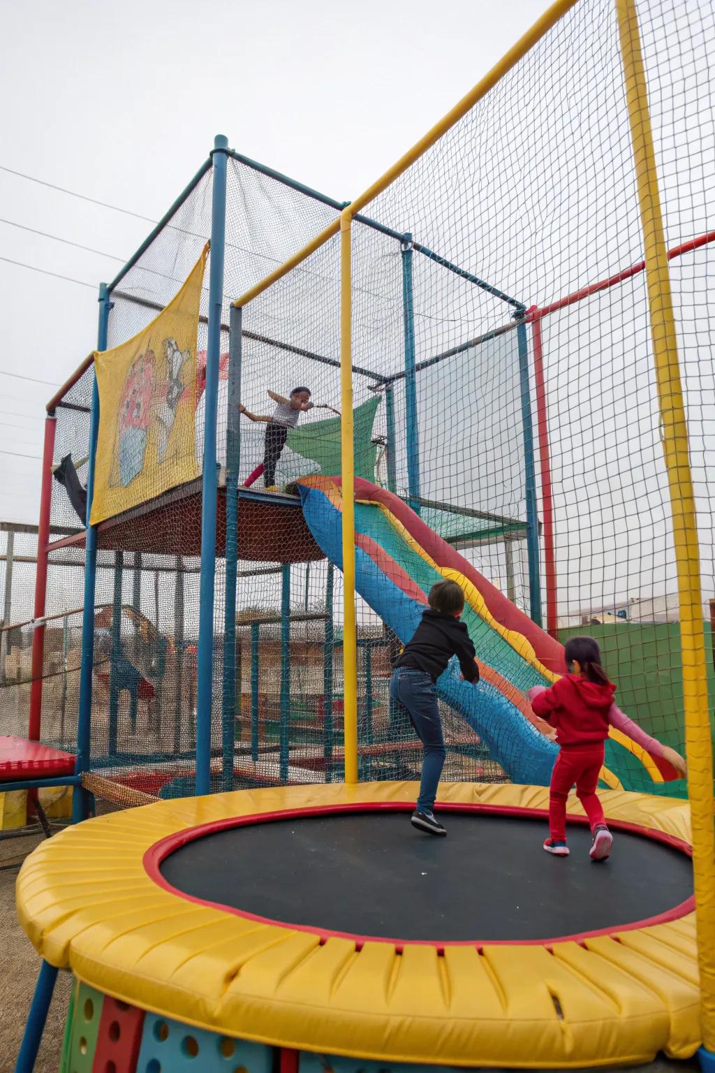 An exciting enclosed play paradise surrounding a bounce platform.