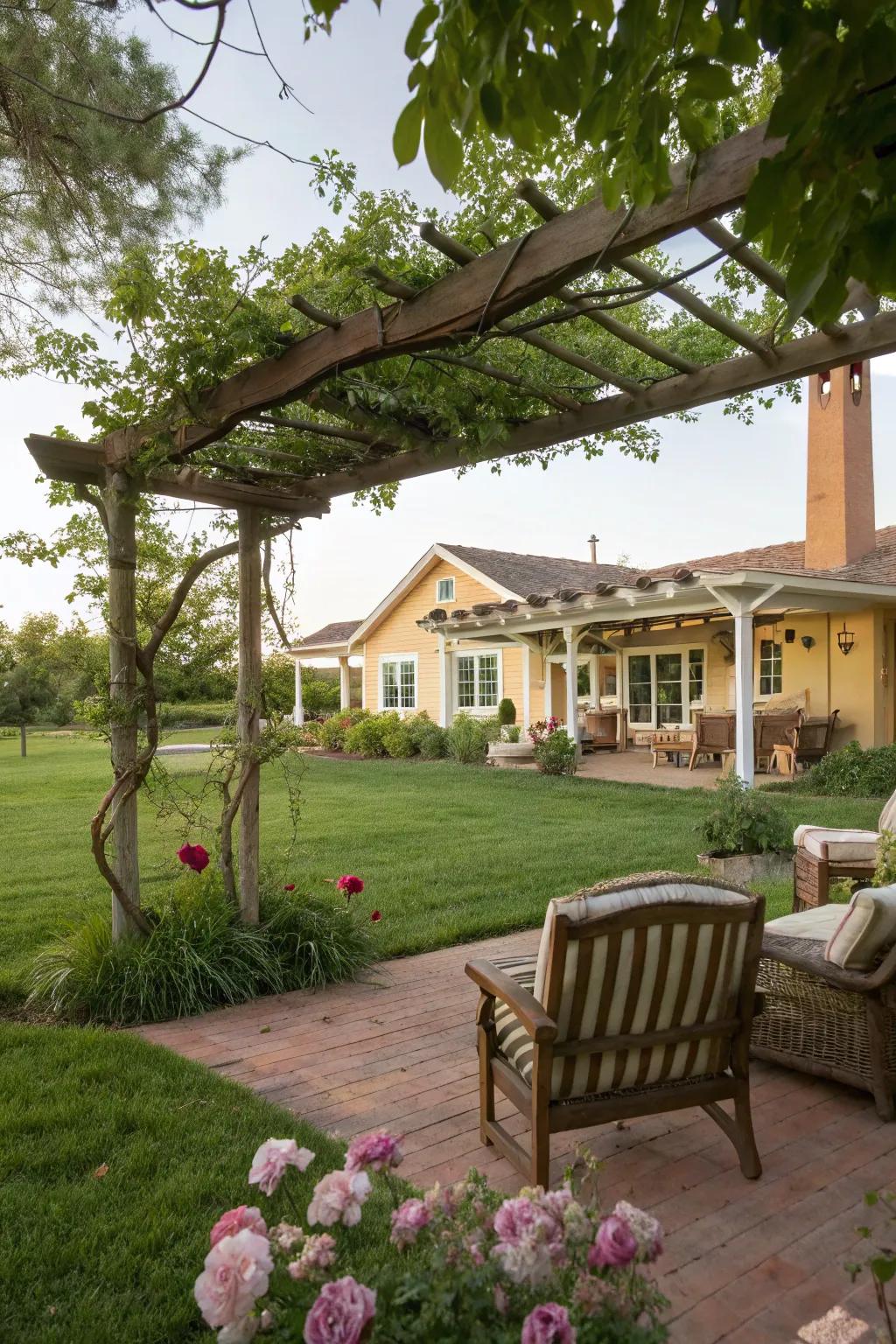 A pergola offers shade and a cozy outdoor room feel.