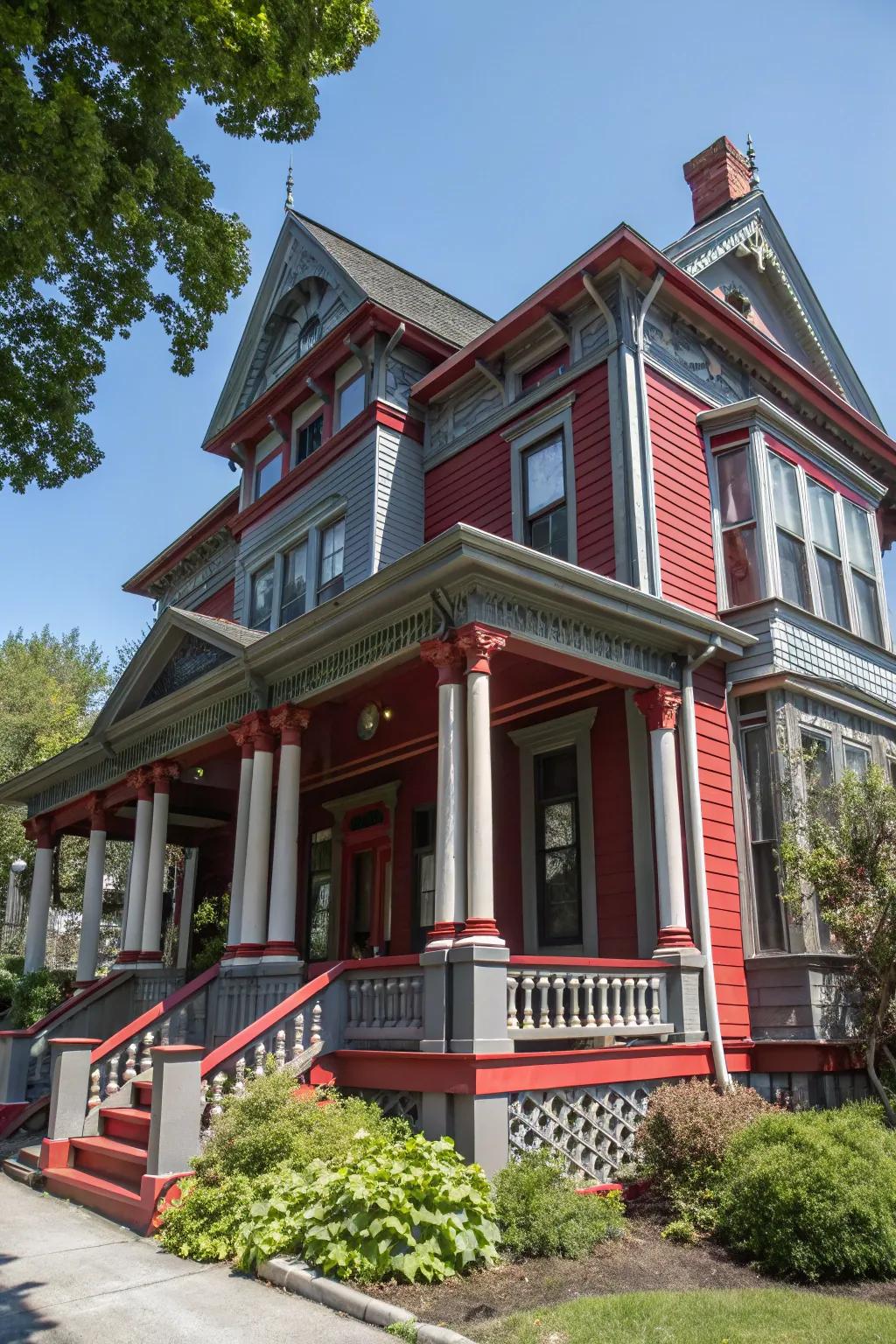 Colonial house with bold red and gray accents.