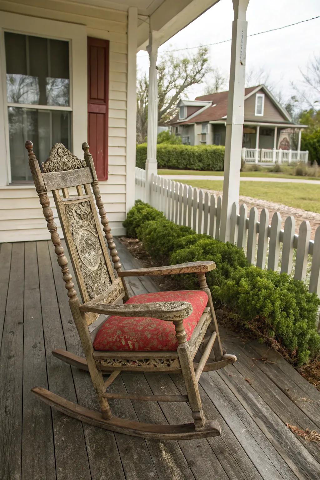 A distinct vintage rocking chair functions as a focalized point poised upon this porch.