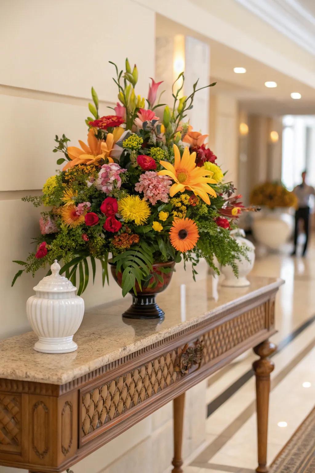 Vibrant floral arrangements transform console tables.