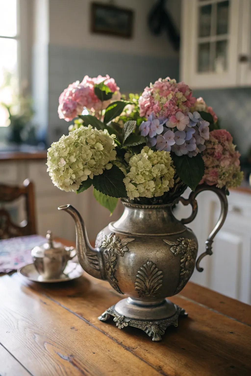 A teapot filled with hydrangeas adds whimsy and charm.