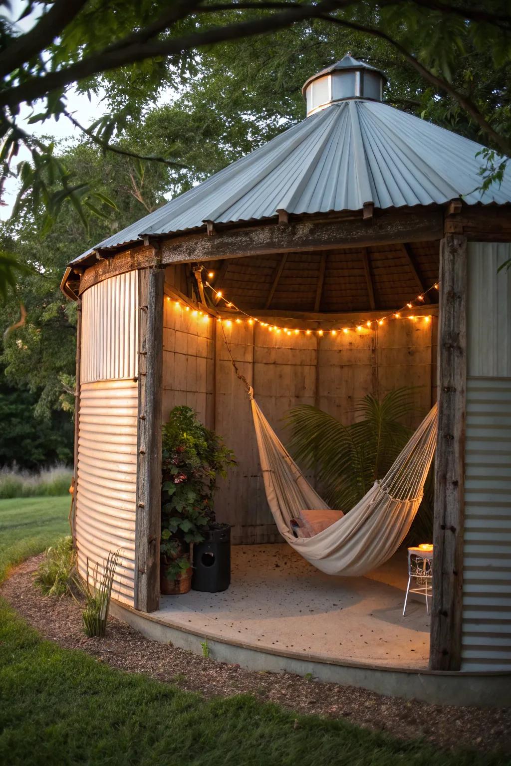 Escape to your backyard oasis with a hammock in your grain bin gazebo—relaxation redefined.