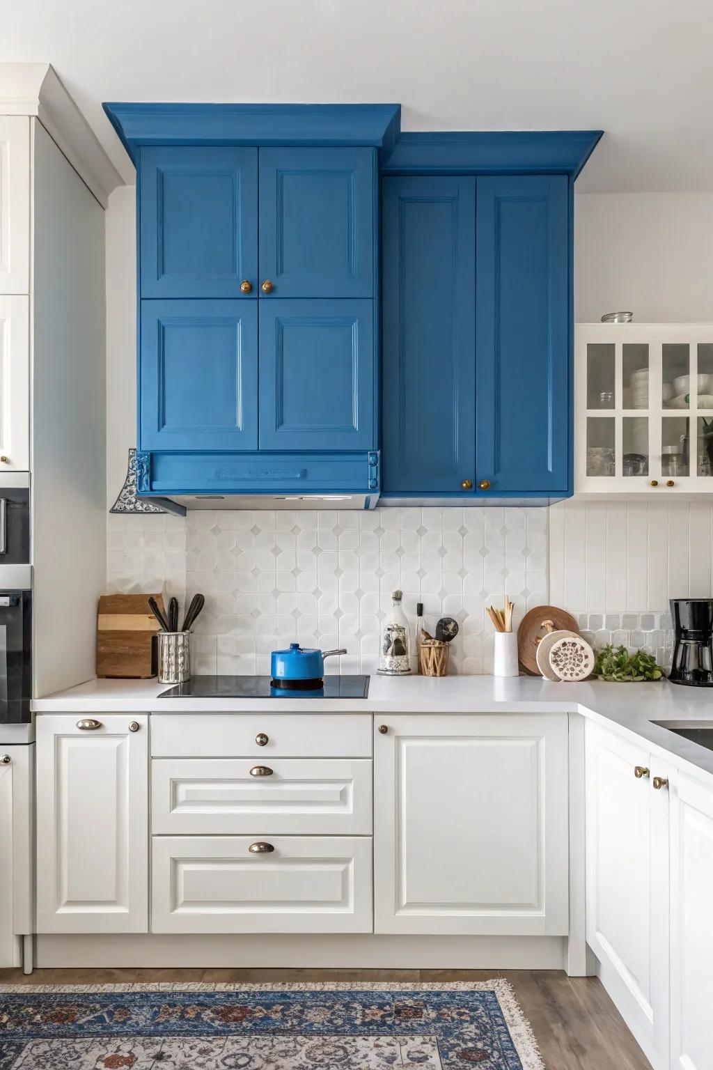 A bold blue bulkhead adding a pop of color in a white kitchen.