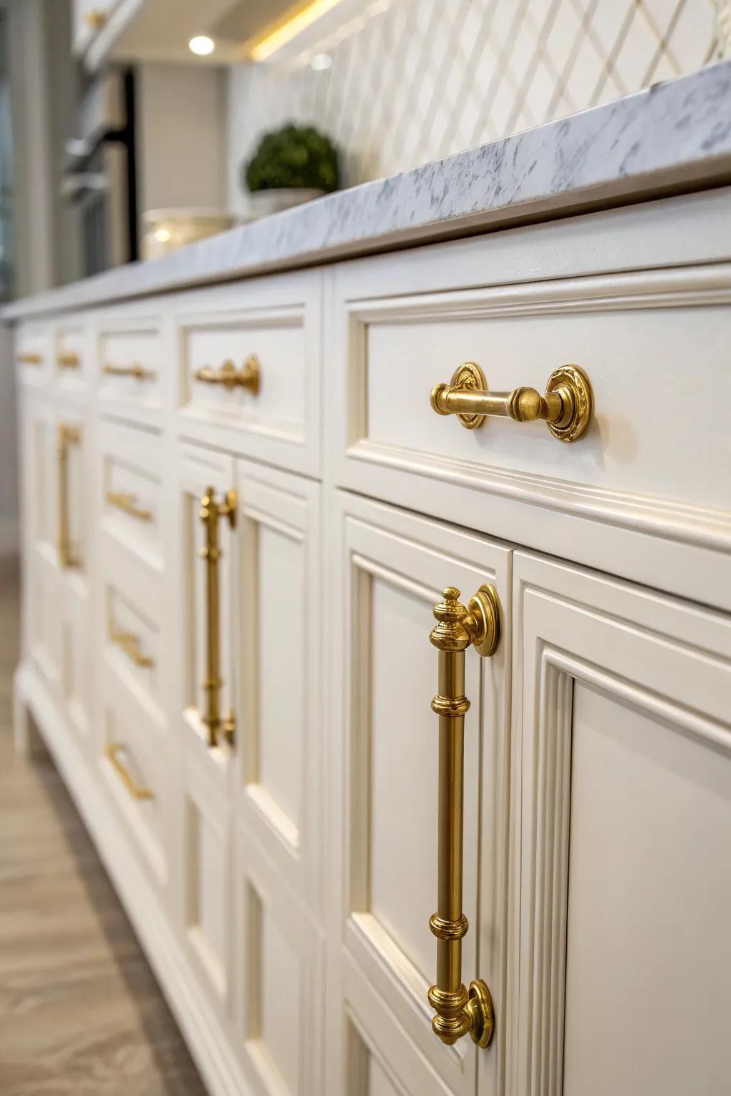 Gold hardware adds a touch of elegance and contrast to white cabinetry.