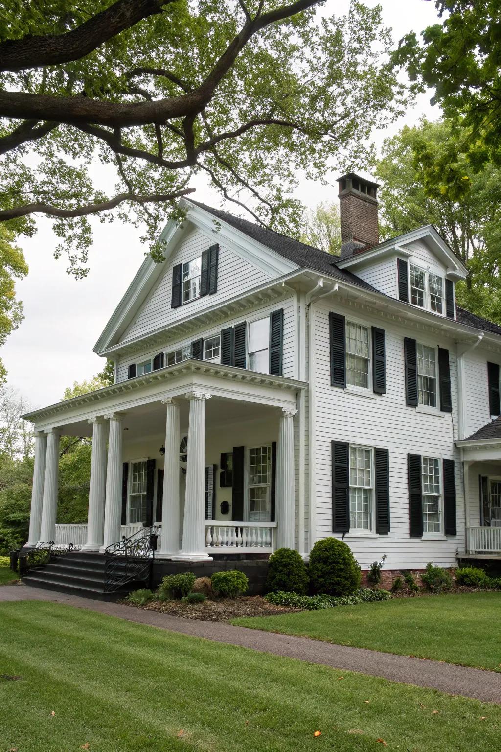 Colonial-style home with white siding and black trim.