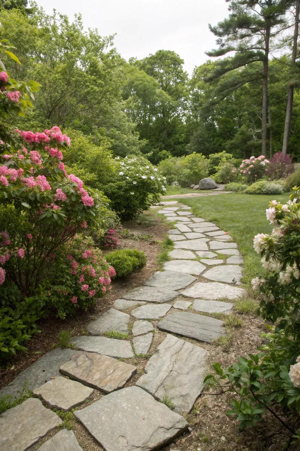 Natural stone pavers blend seamlessly with lush gardens.
