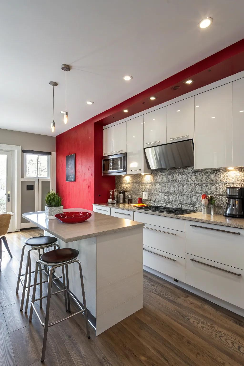 Modern kitchen with a bold red accent wall.