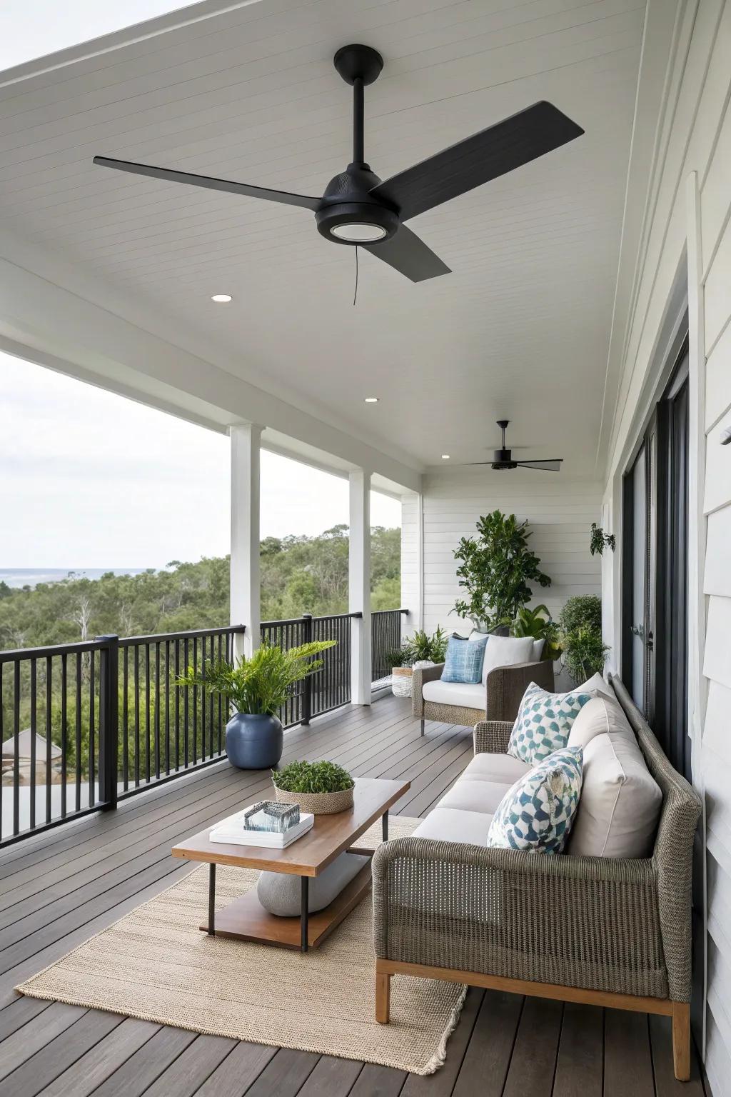 A modern fan enhances the sleek aesthetic of this minimalist porch.