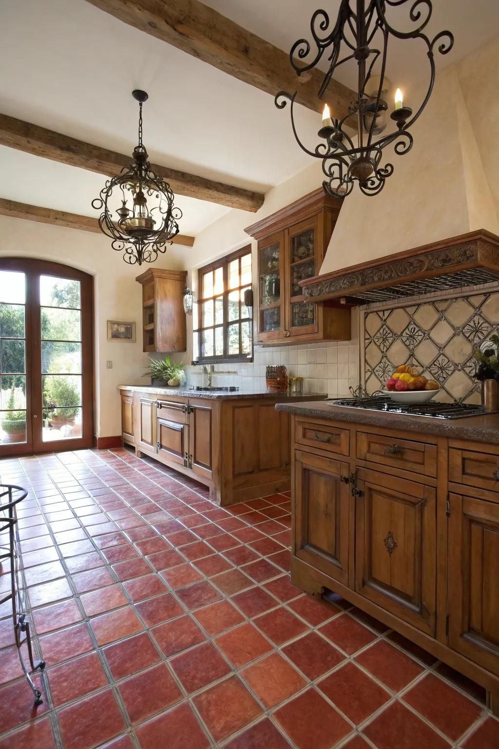 A kitchen with rustic red terra cotta floors for a Tuscan feel.