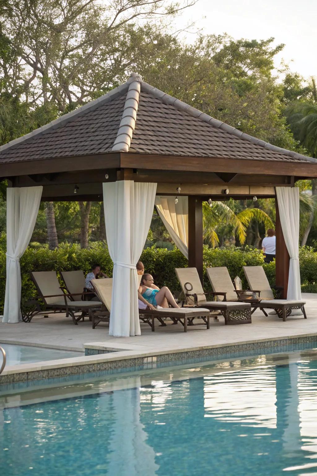 Relax by the pool in your shaded pavilion.