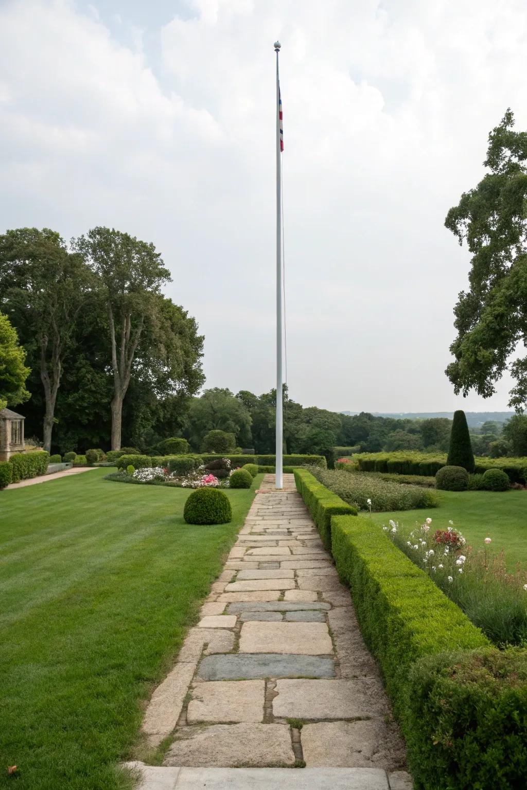 A stone pathway provides a welcoming route to a flagpole.