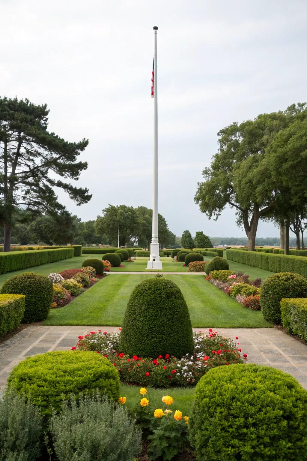 Bushes and shrubs add depth and greenery to a flagpole landscape.