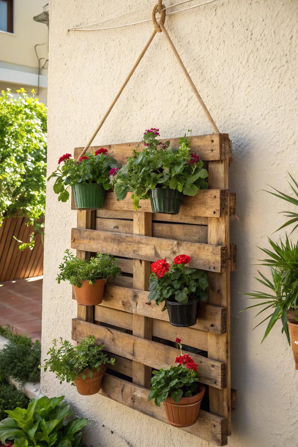 Elevate your garden space with a handcrafted hanging pallet planter, perfect for small balconies.