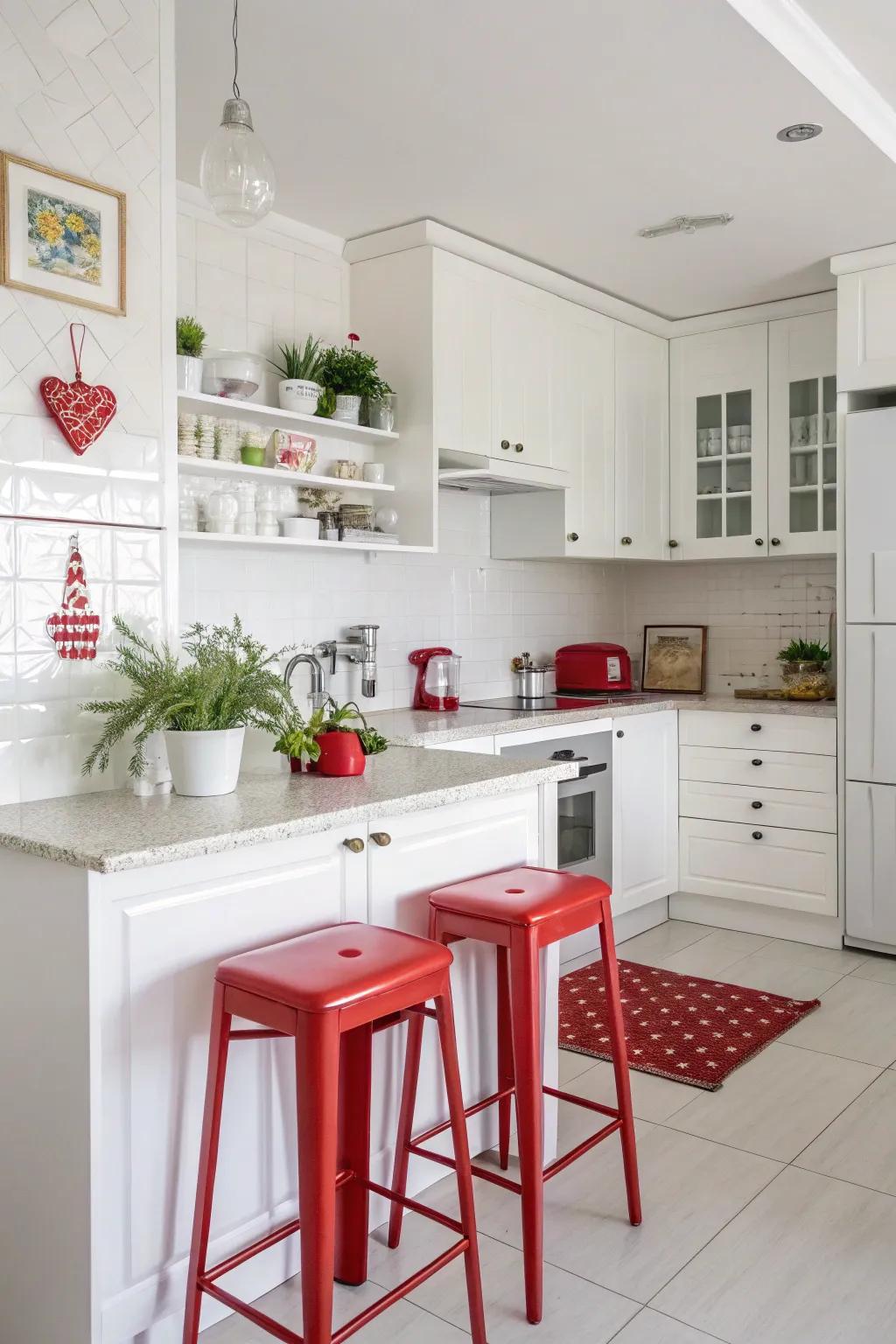 A predominantly white kitchen is enhanced with vibrant red accents.