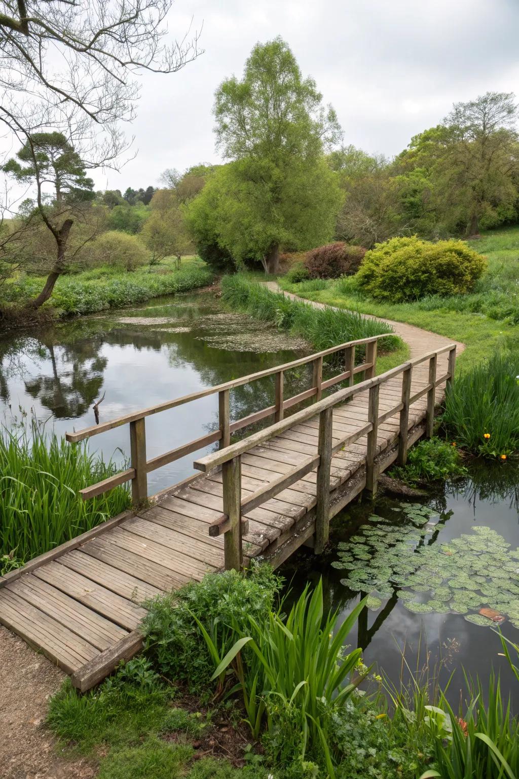 A charming bridge adding character and function to a pond setting.