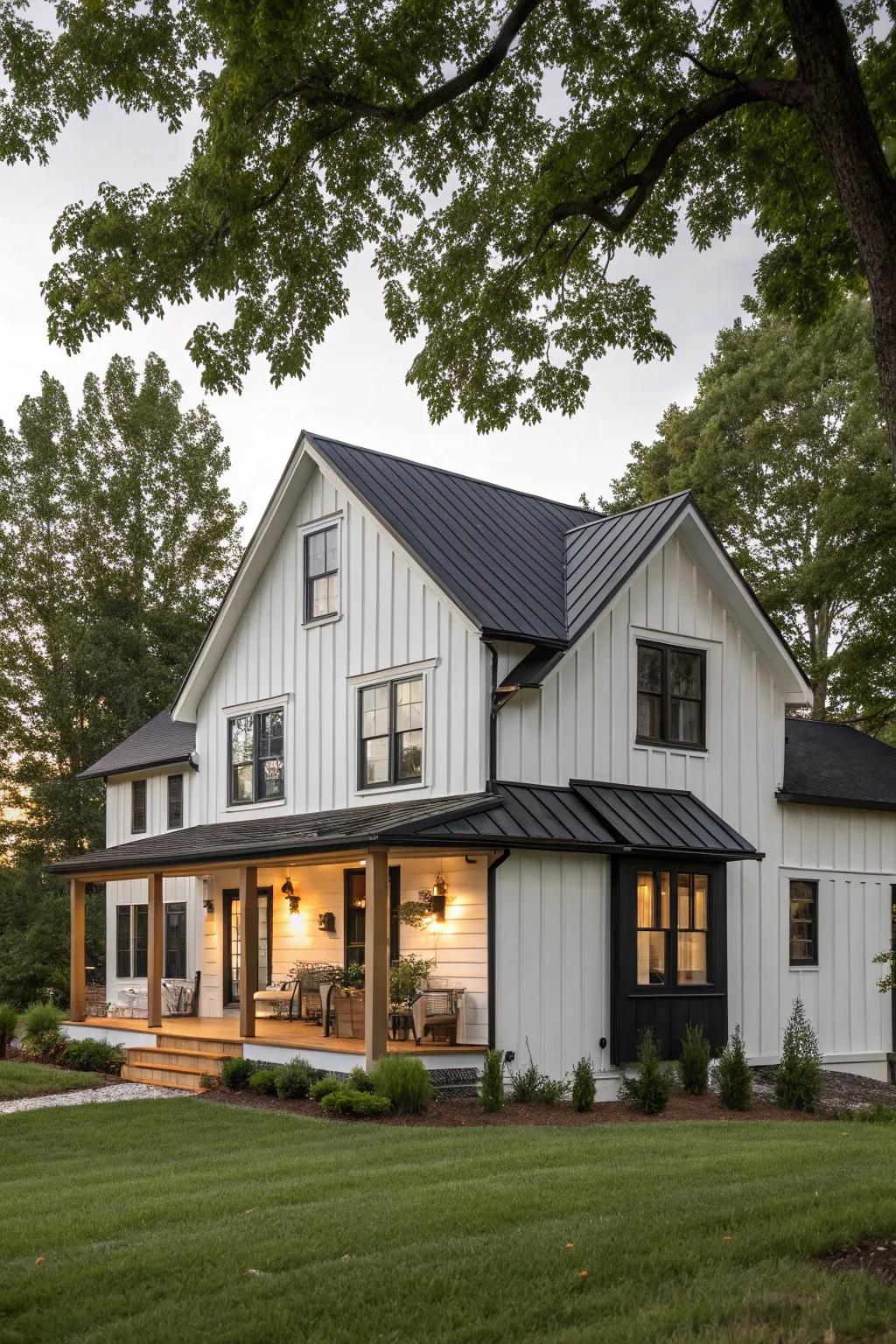 A modern farmhouse with light siding and dark accents.