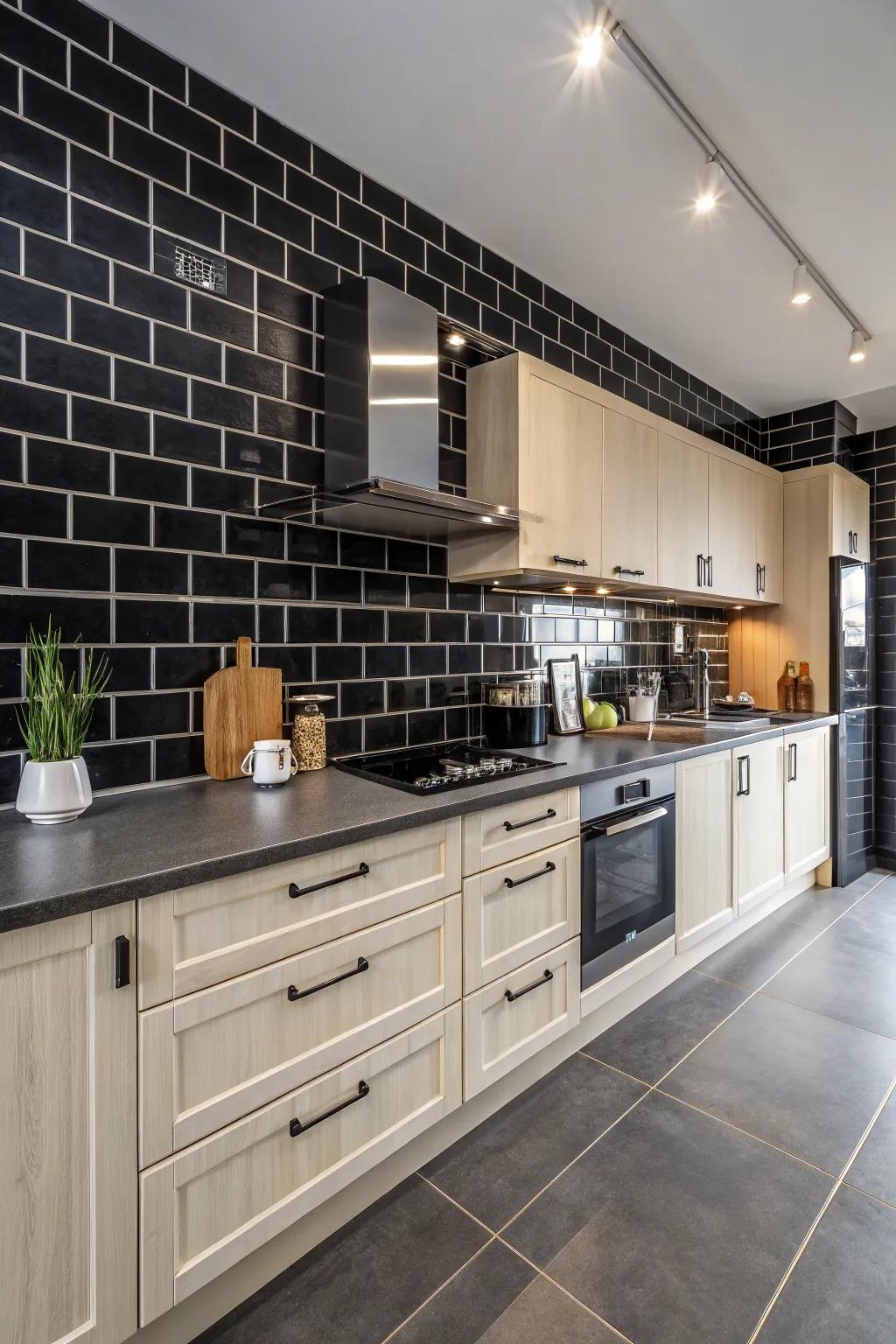 Dark tiles contrast stunningly against light cabinetry within this cooking area.