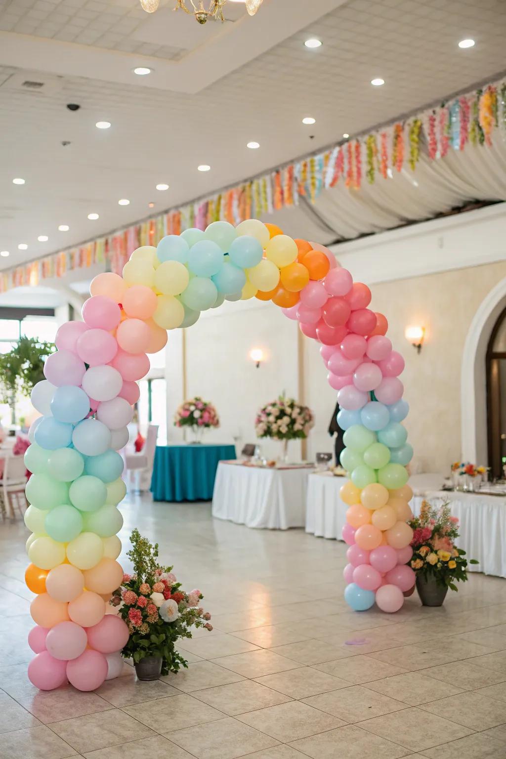 Artful balloons create a fun and colorful wedding arch.