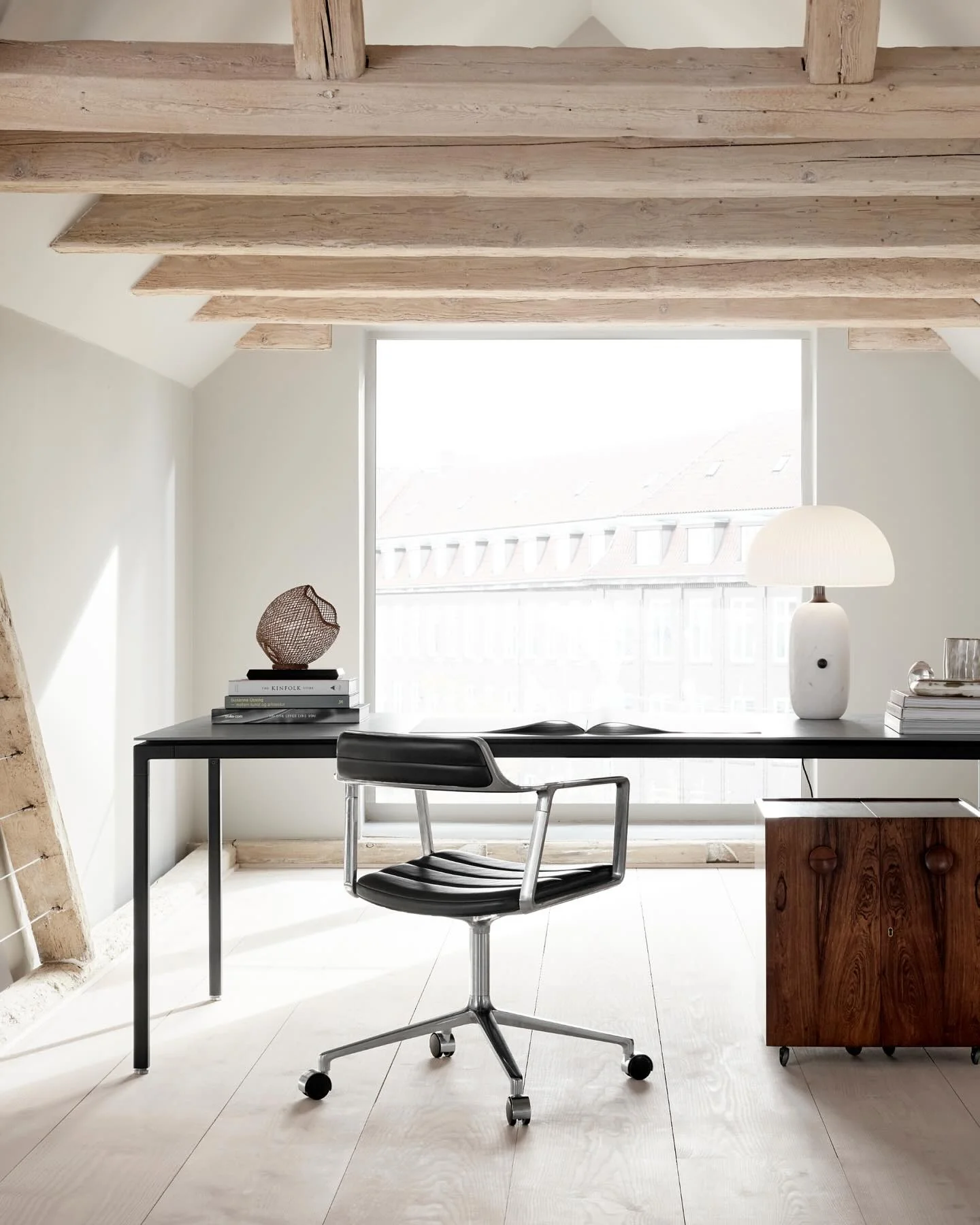 4. Minimalist Loft Desk with Exposed Beams and Monochrome Palette (Loft Office Ideas)