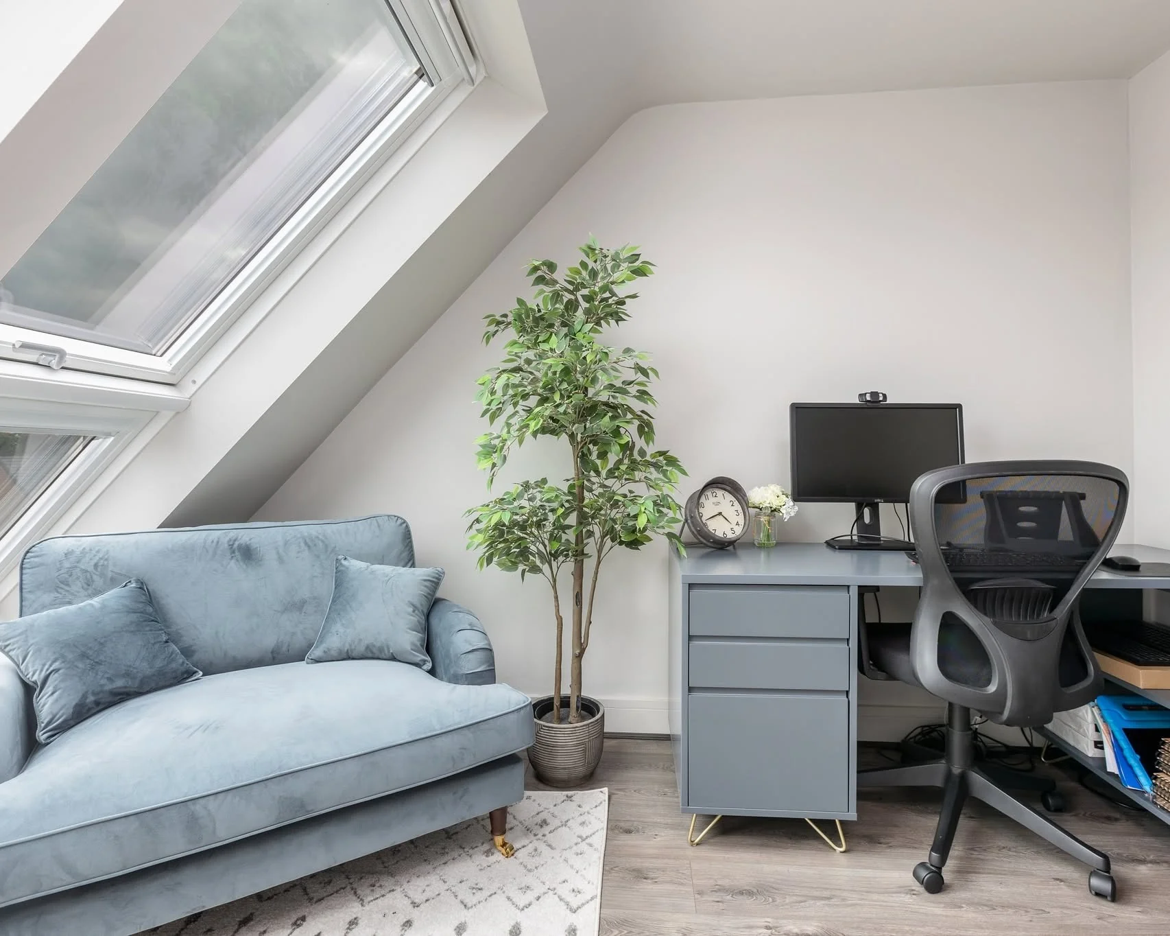 2. Soft Gray Skylit Loft Office with Cozy Seating Nook (Loft Office Ideas)