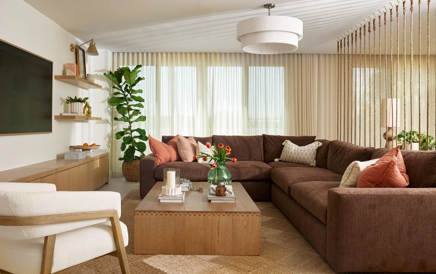 3. Warm Mocha Sectional with Natural Wood Elements (Brown Furniture Living Room Ideas)