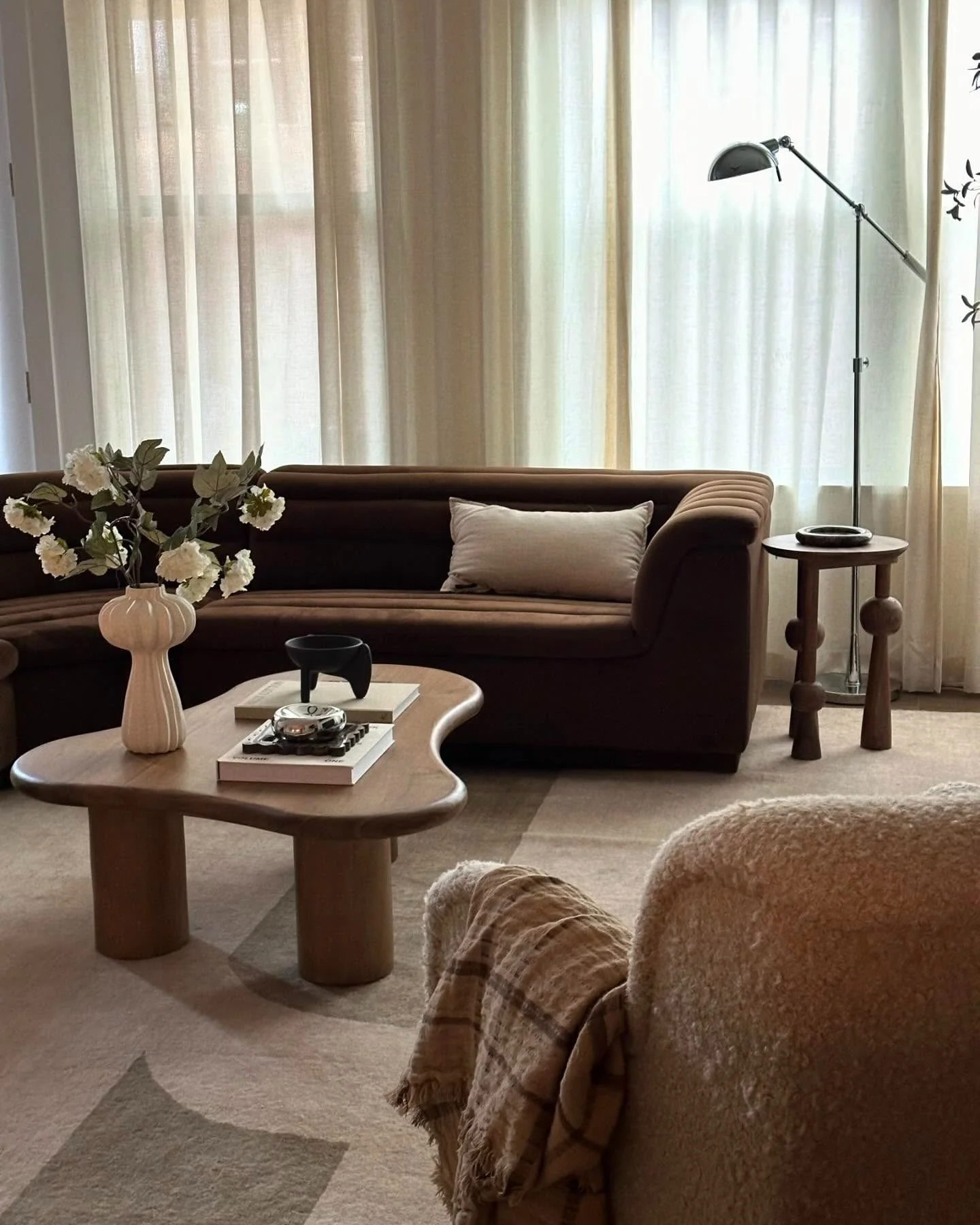 13. Chocolate Brown Sofa with Soft Minimal Layers (Brown Furniture Living Room Ideas)