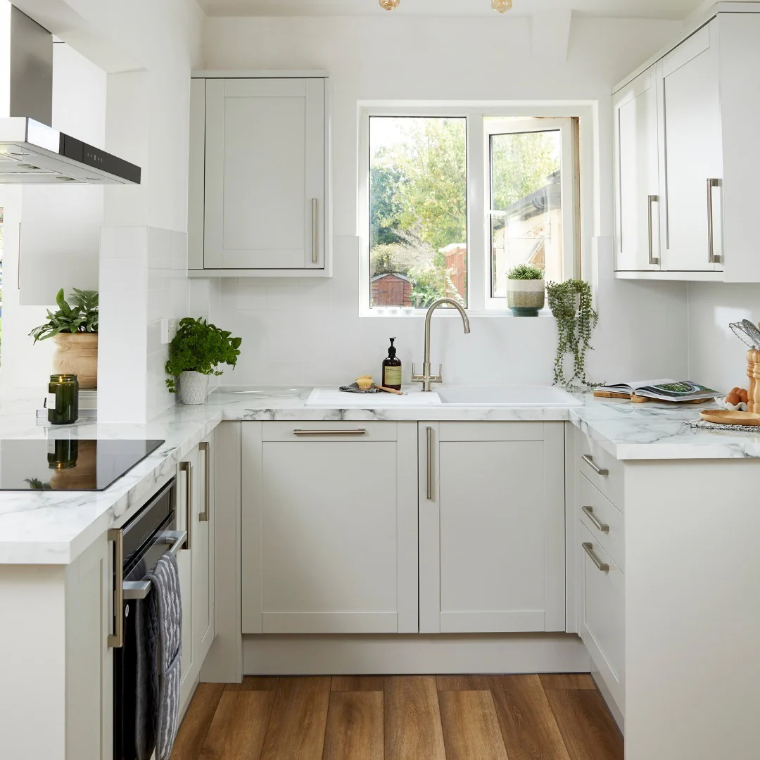 13. Soft Gray Cabinets with White Marble Counters (Small Space Kitchen Ideas)