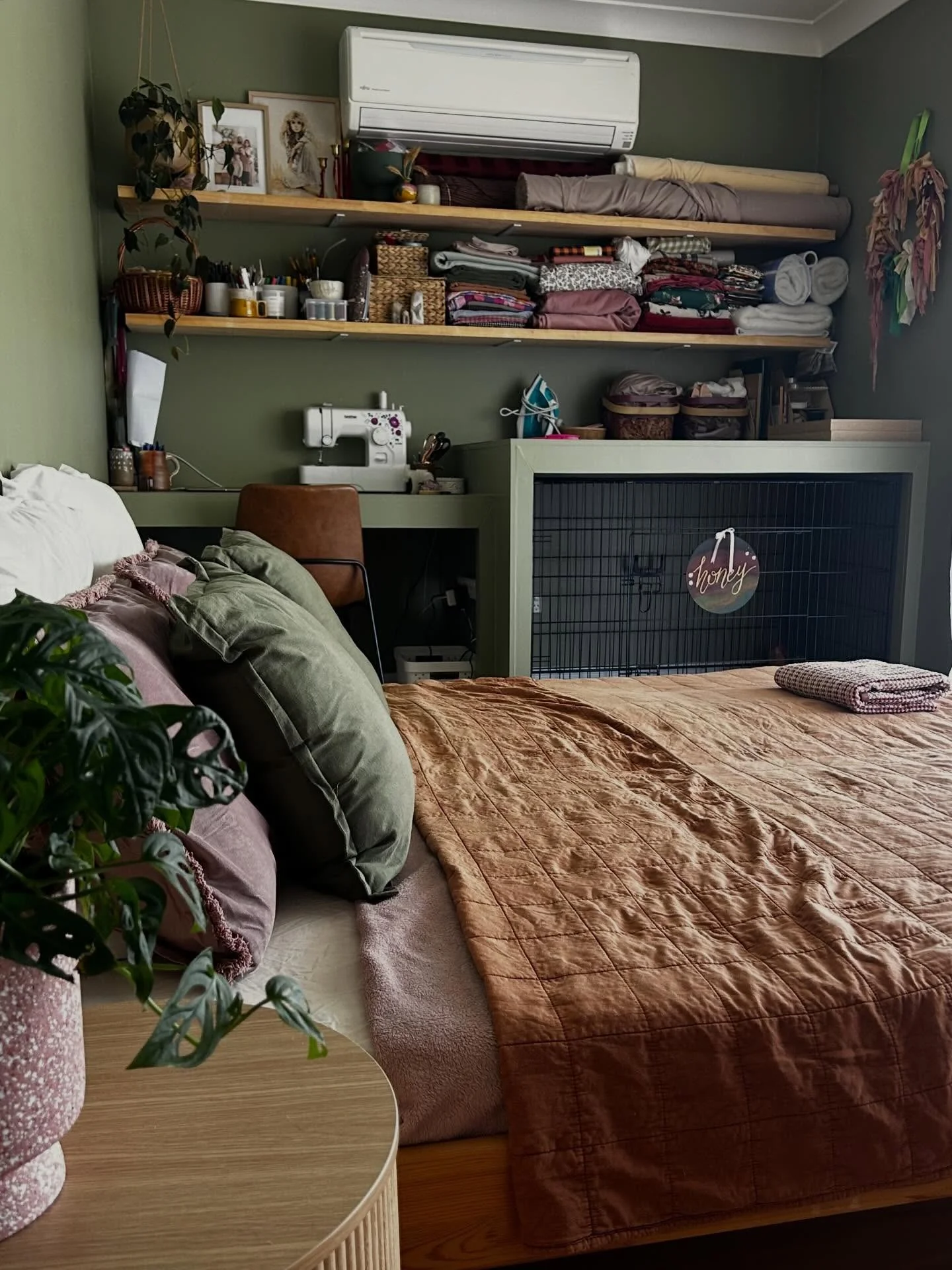 8. Olive Green Craft Bedroom with Wall-to-Wall Desk Storage (Bedroom Ideas with a Desk)