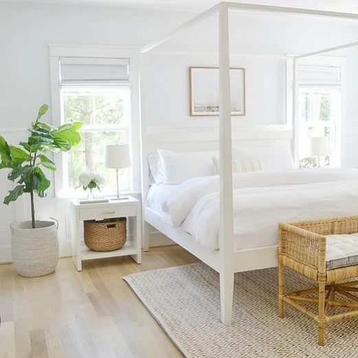 3. Airy Coastal White Canopy Bedroom with Natural Elements (All White Bedroom Ideas)