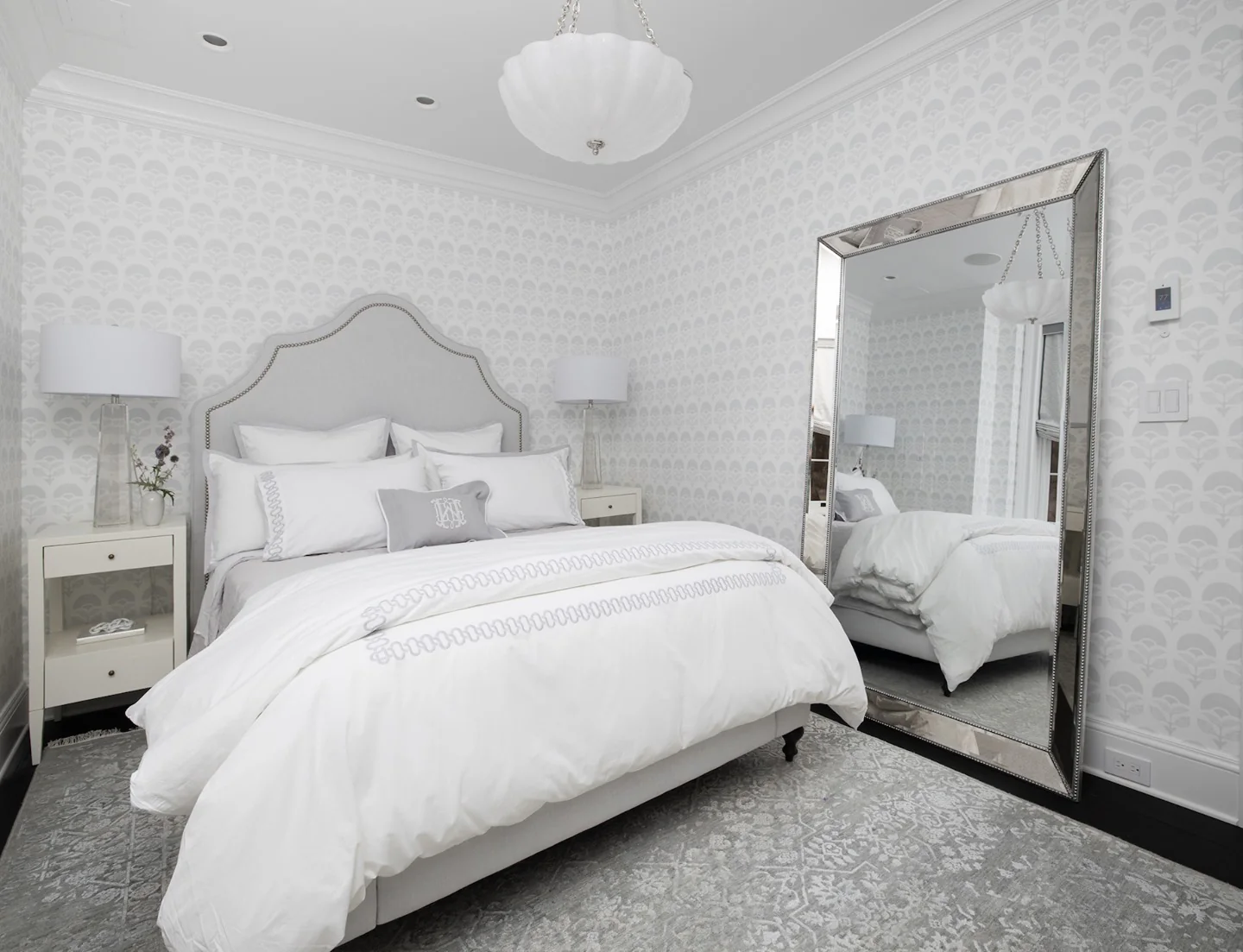 7. Patterned White Bedroom with Statement Mirror (All White Bedroom Ideas)