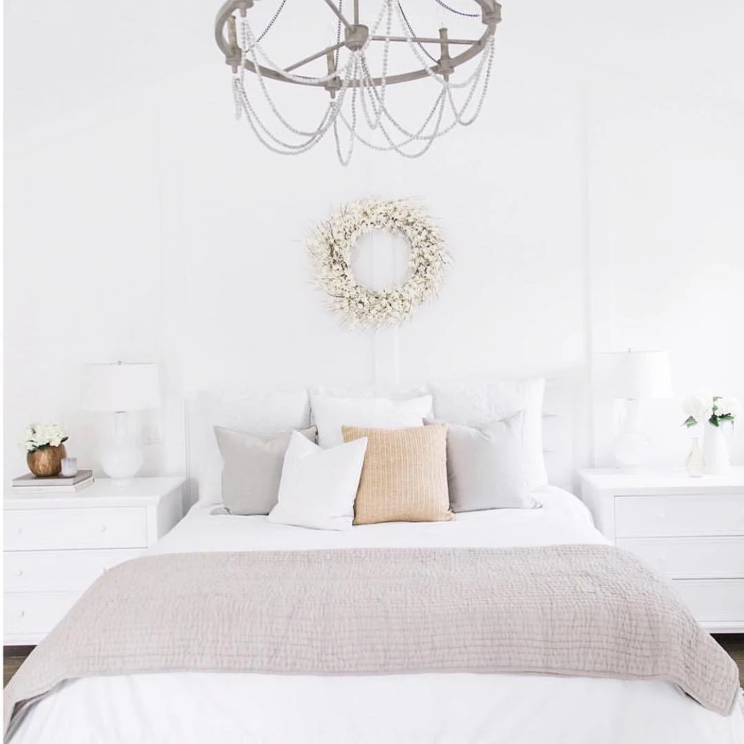 11. Classic White Bedroom with Soft Beige Accents (All White Bedroom Ideas)