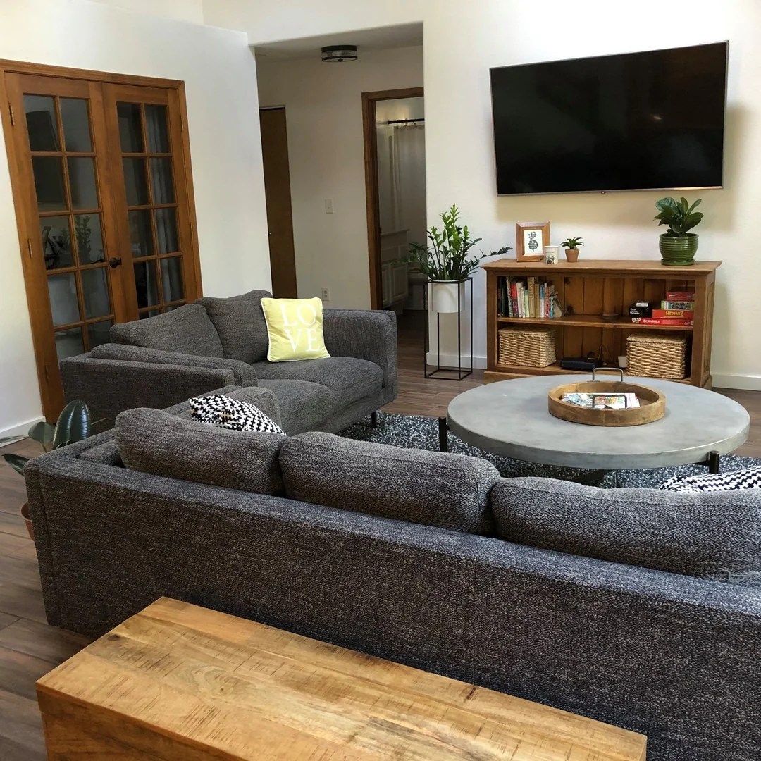 11. Casual Charcoal Gray Living Room with Warm Wood Accents (Gray Furniture Living Room Ideas)