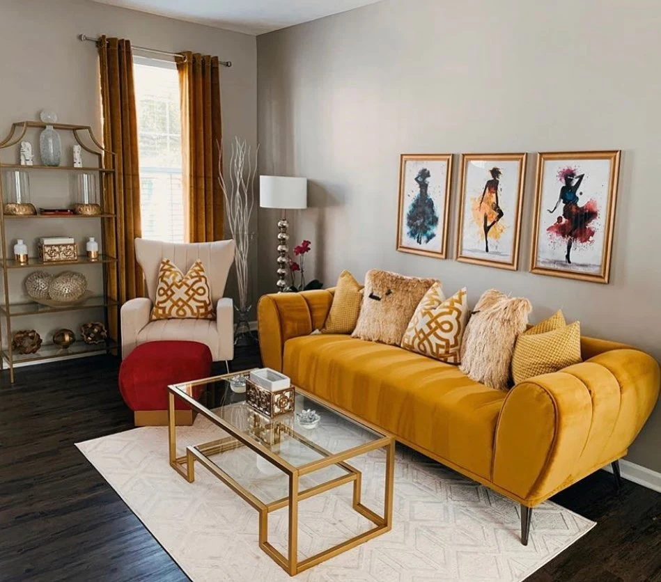 3. Golden Velvet Sofa with Soft Gray Backdrop (Yellow and Gray Living Room Ideas)