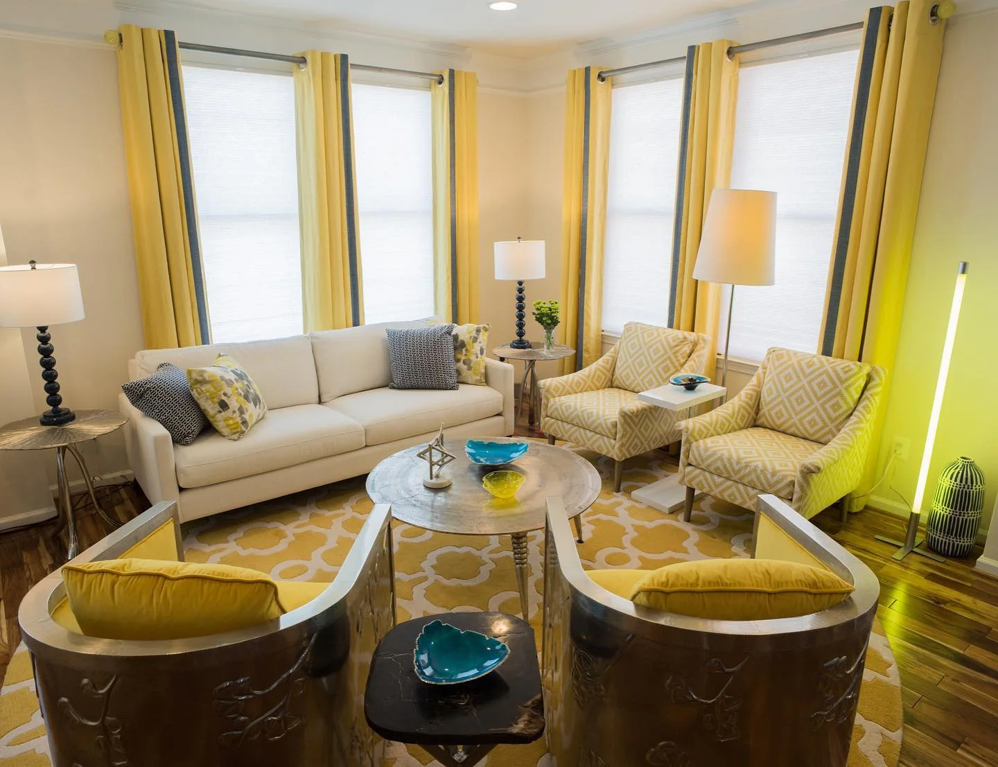 12. Tailored Yellow Drapery with Cream and Gray Seating (Yellow and Gray Living Room Ideas)