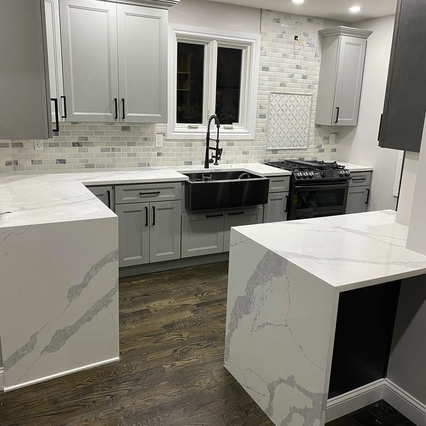 4. Transitional Light Grey Cabinets with Farmhouse Sink (Light Grey Kitchen Cabinets Ideas)