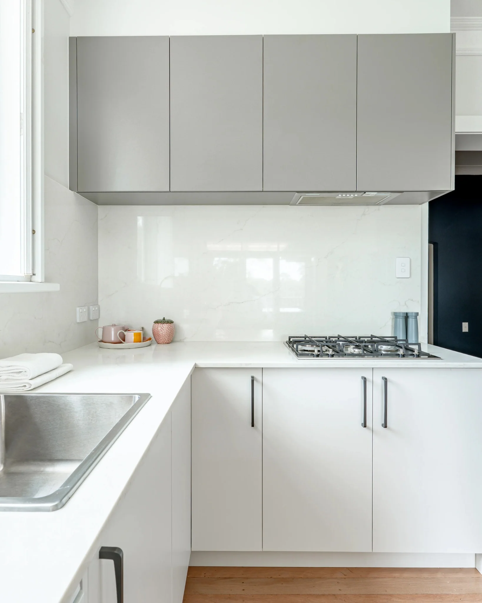 9. Elegant Light Grey Cabinets with Brass Hardware (Light Grey Kitchen Cabinets Ideas)