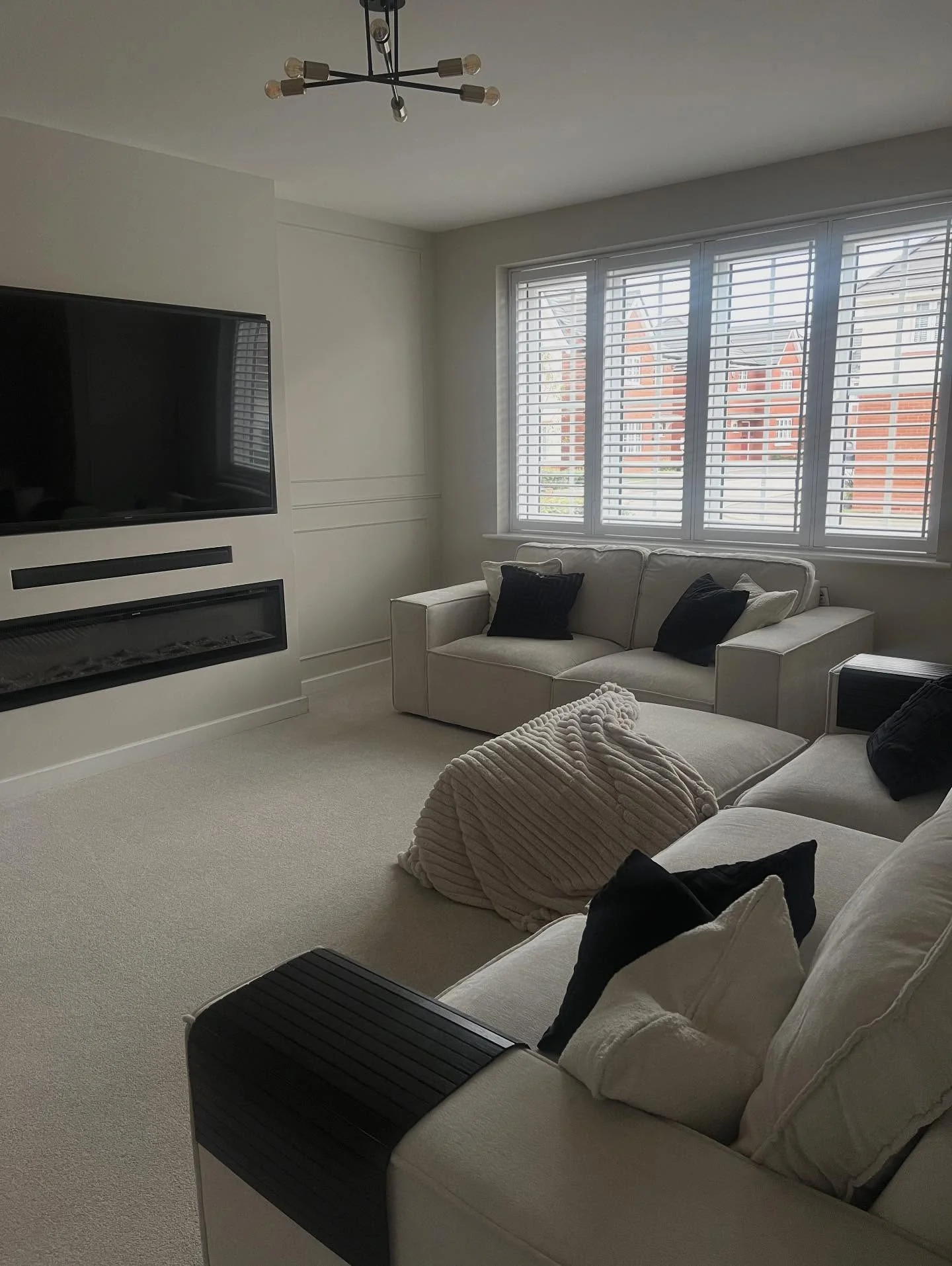 8. Subtle Greige Paneling for Contemporary Calm (Empty Wall Ideas for Living Room)