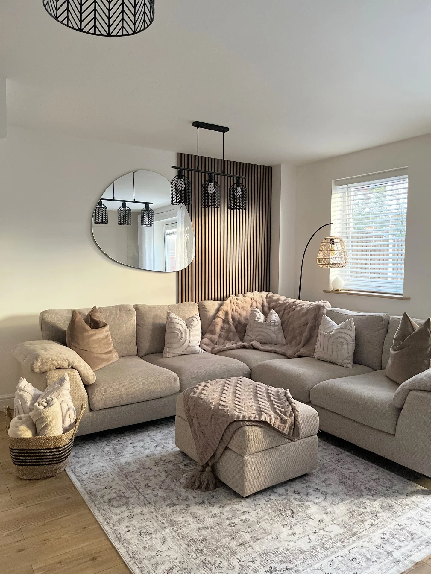 12. Vertical Wood Slat Accent in Warm Neutral Tones (Empty Wall Ideas for Living Room)