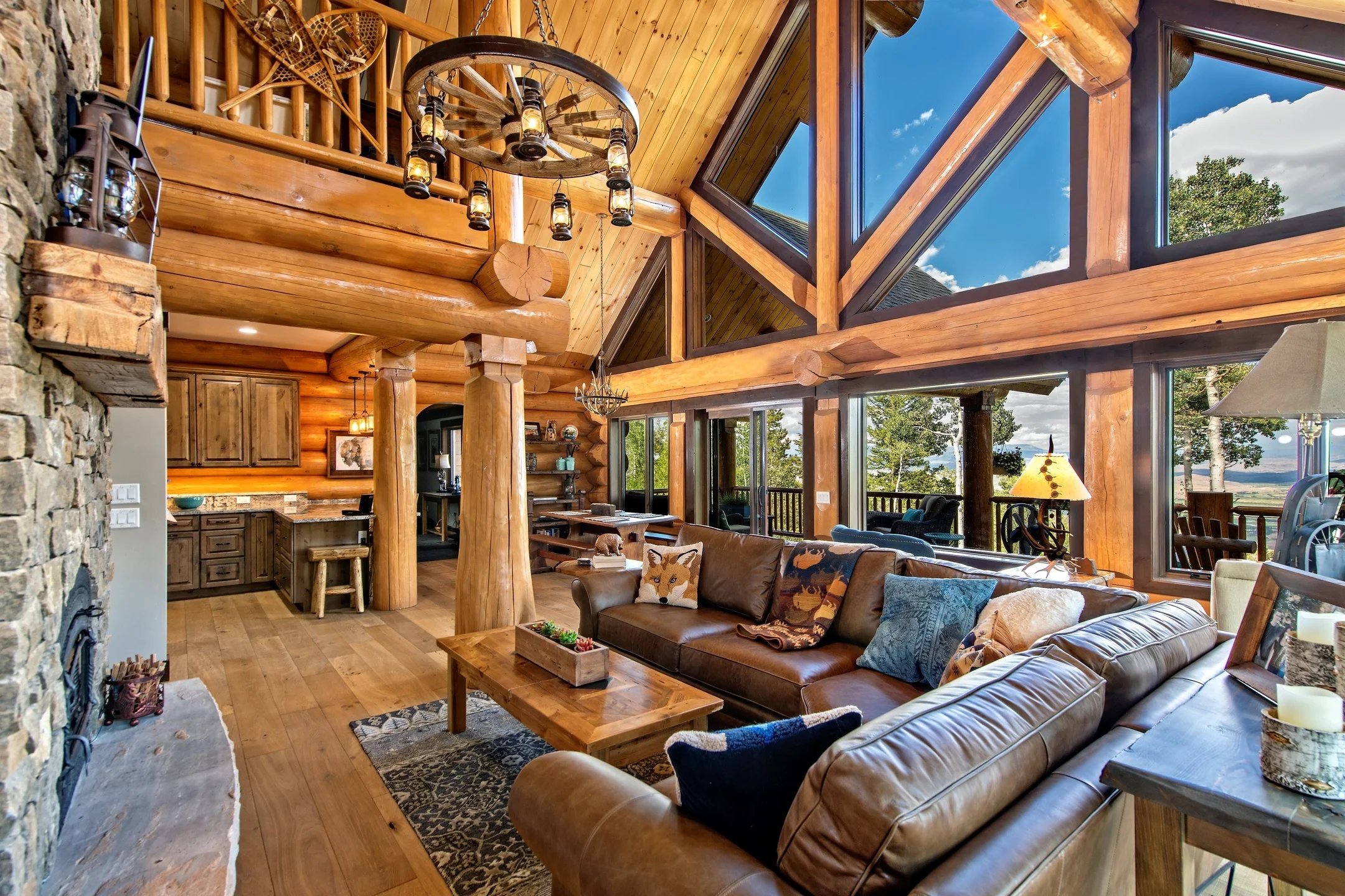 4. Grand Timber Retreat in Caramel and Natural Wood (Rustic Living Room Furniture Ideas)