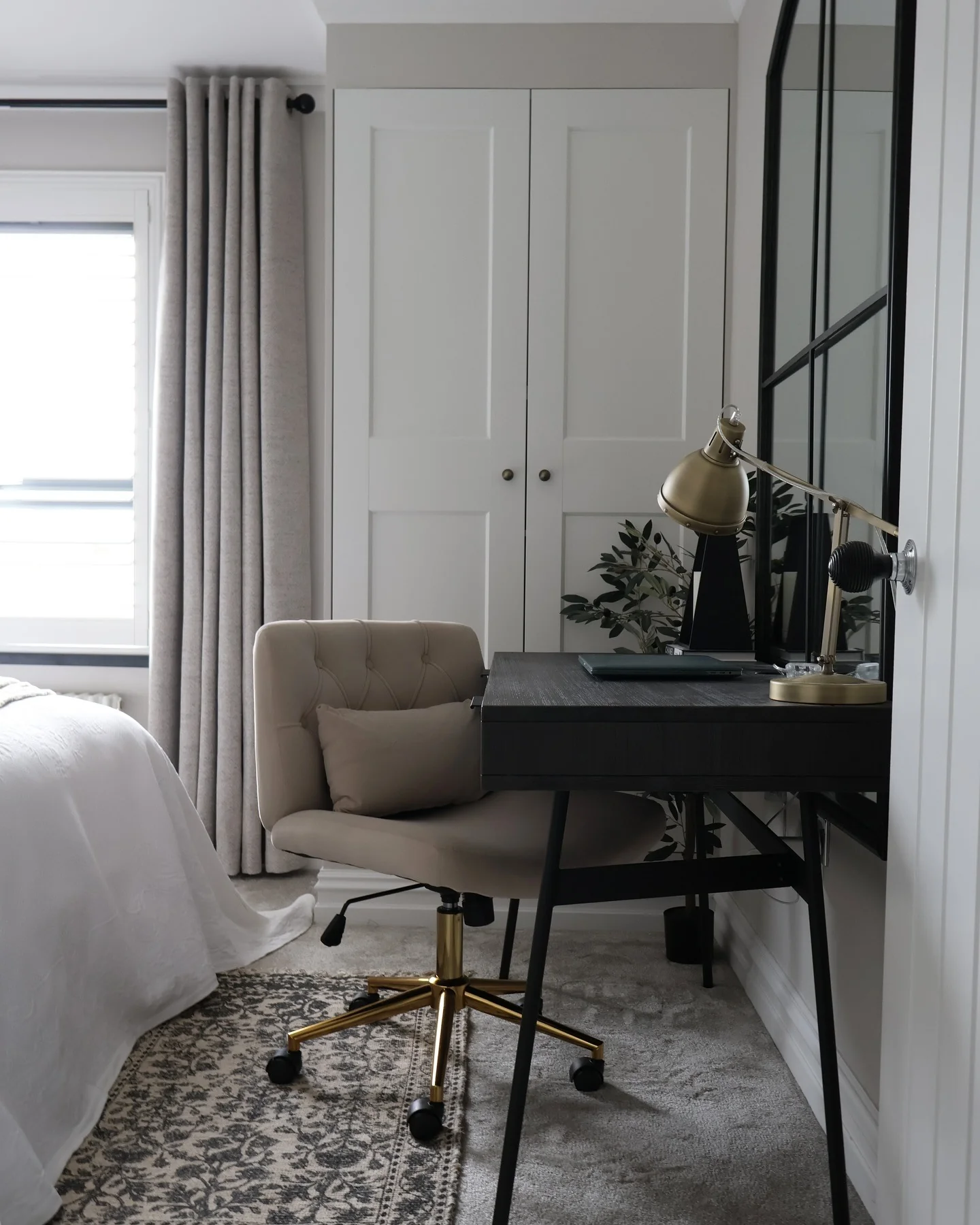 15. Modern Bedroom Desk Setup with Black, Cream, and Brass Details (Bedroom Home Office Ideas)