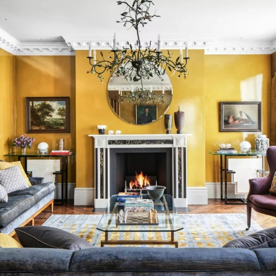 8. Warm Yellow Transitional Living Room with Elegant Details (Yellow Walls Living Room Ideas)