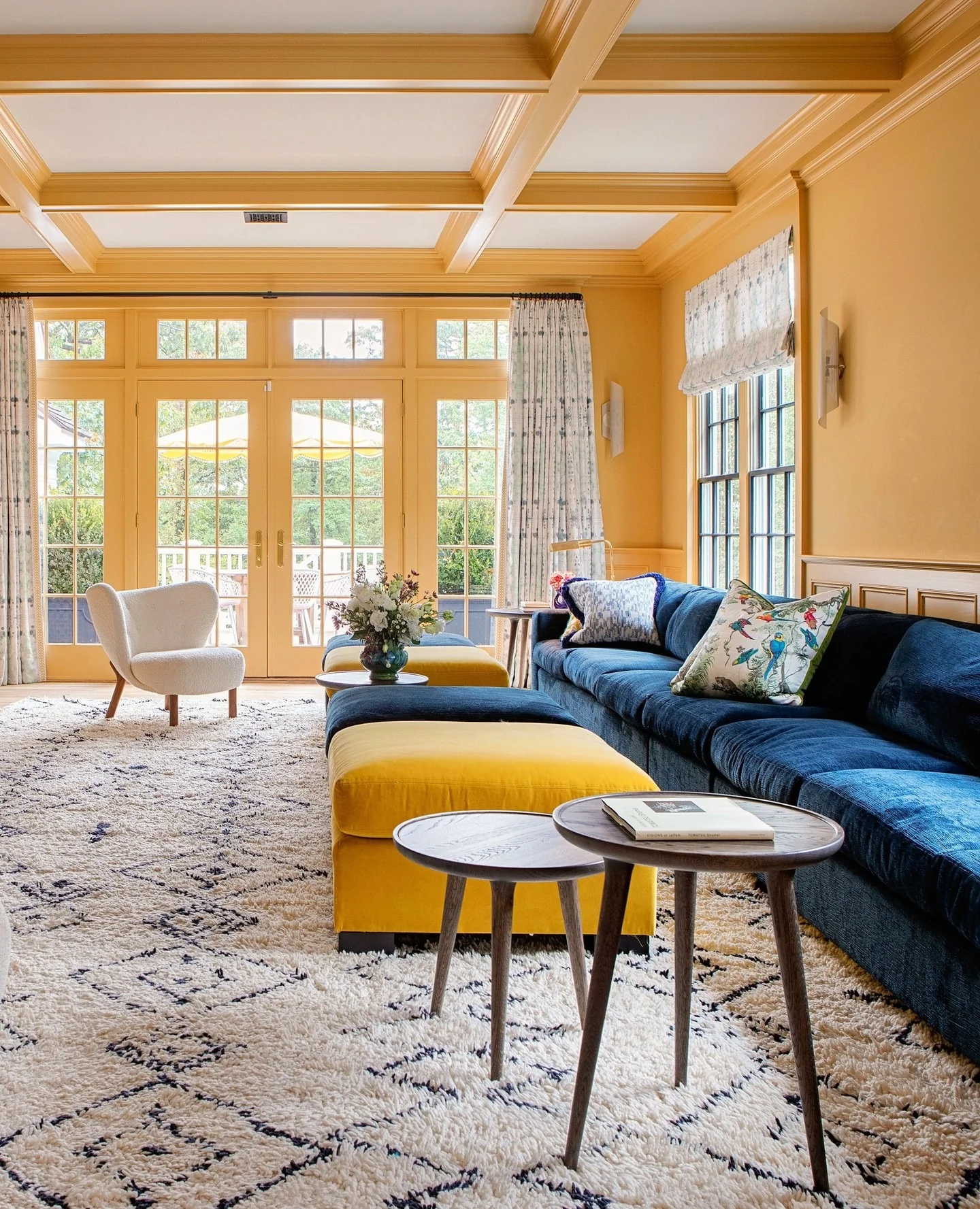 13. Warm Yellow Living Room with Blue Upholstery Contrast (Yellow Walls Living Room Ideas)