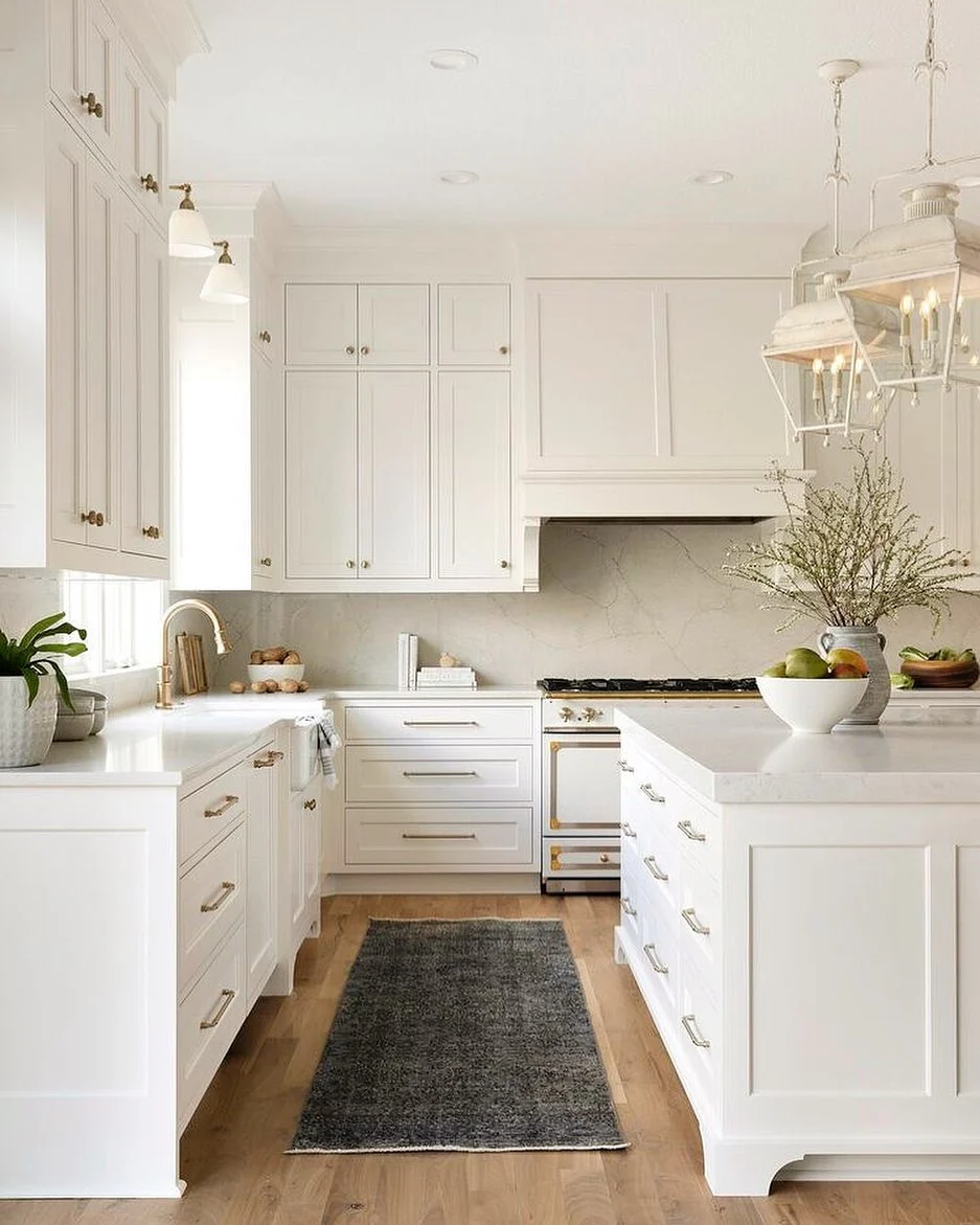 3. Classic White European Kitchen with Warm Brass Accents (European Kitchen Ideas)