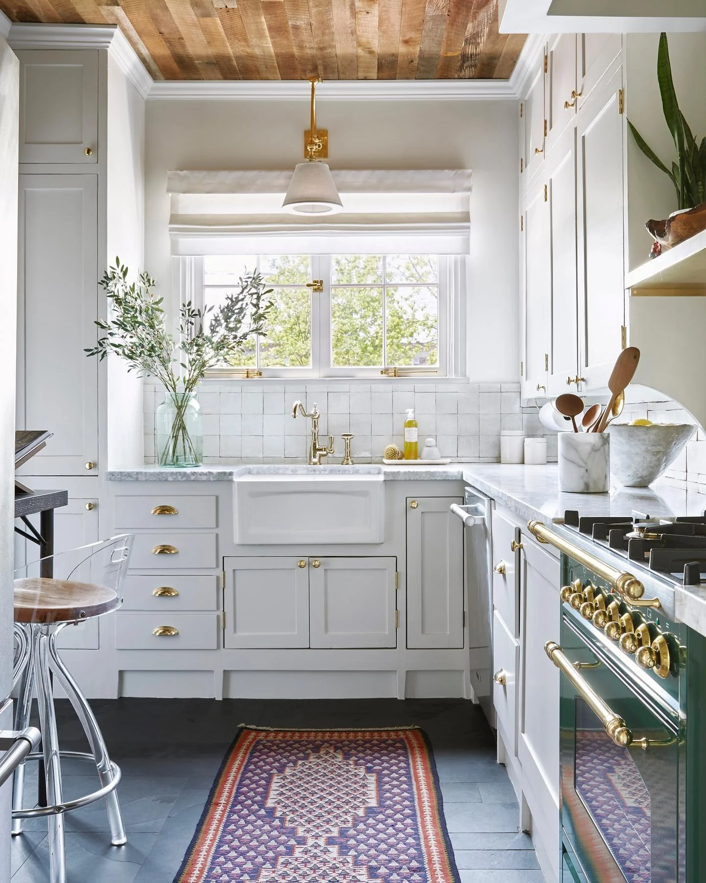14. Compact European Kitchen with Light Gray Cabinets and Brass Details (European Kitchen Ideas)
