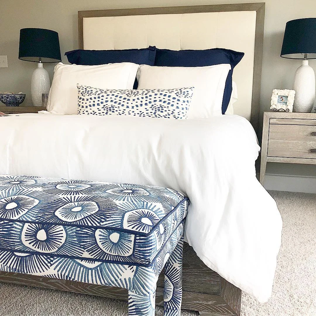 5. Classic Coastal Comfort in White and Navy (Beach Style Bedroom Ideas)