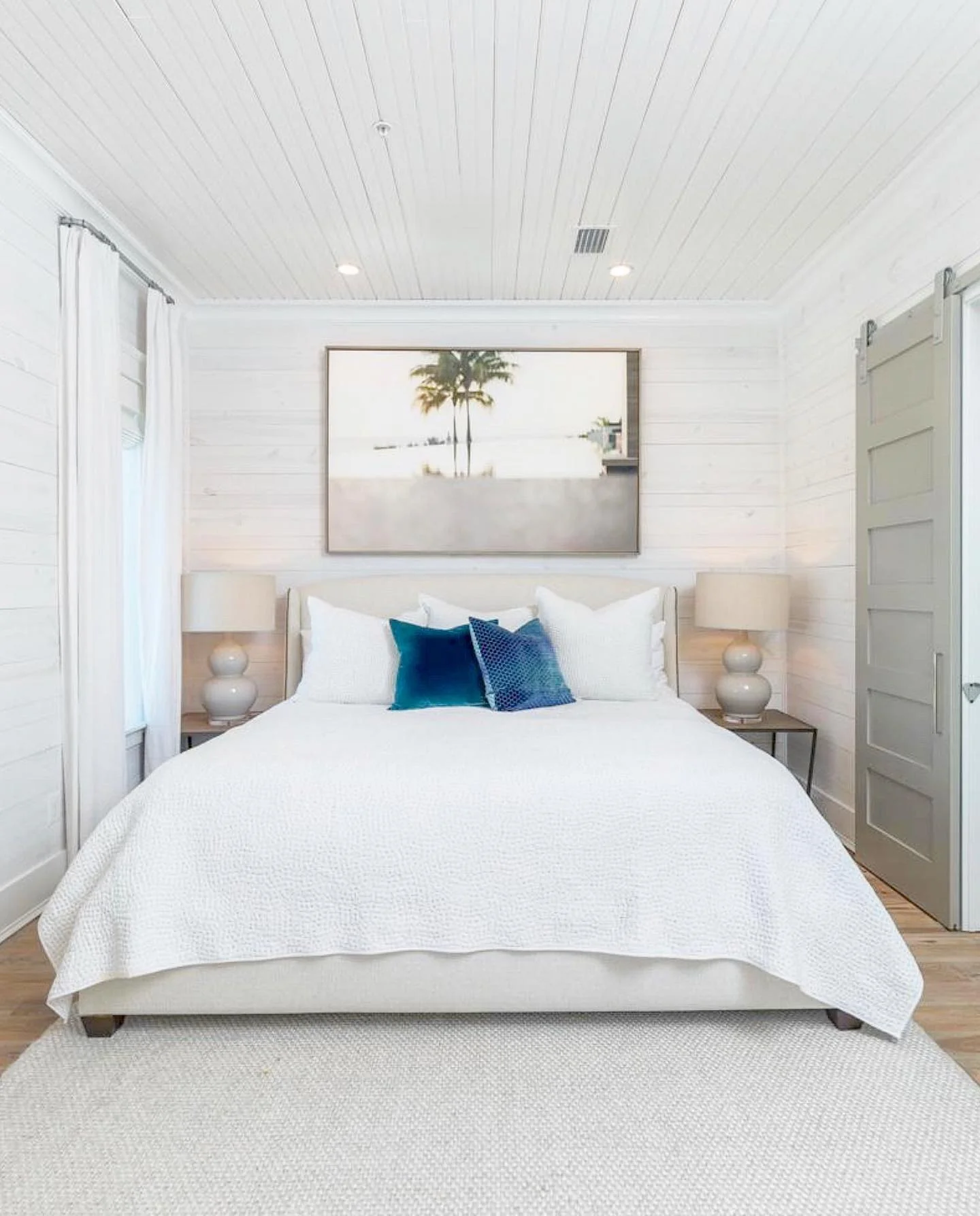 6. Light and Airy Coastal Suite in White and Teal (Beach Style Bedroom Ideas)